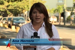 Reporter speaking while on the street in Caracas