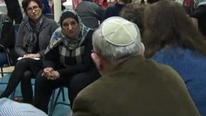 Members of the Jewish and Muslim community participate in a discussion.